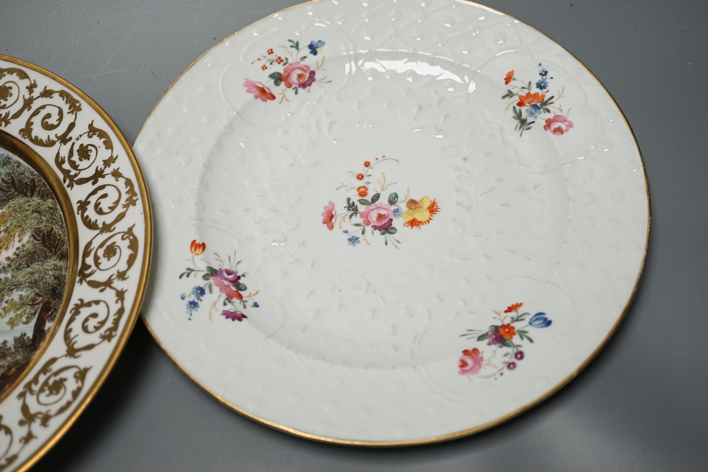 18th/19th century cabinet plates - A rare early Coalport landscape dessert plate, c.1805-10, a Coalport style plate, a Worcester blue and gilt foliate dish, c. 1790 and a pair of Royal Worcester dishes (5)